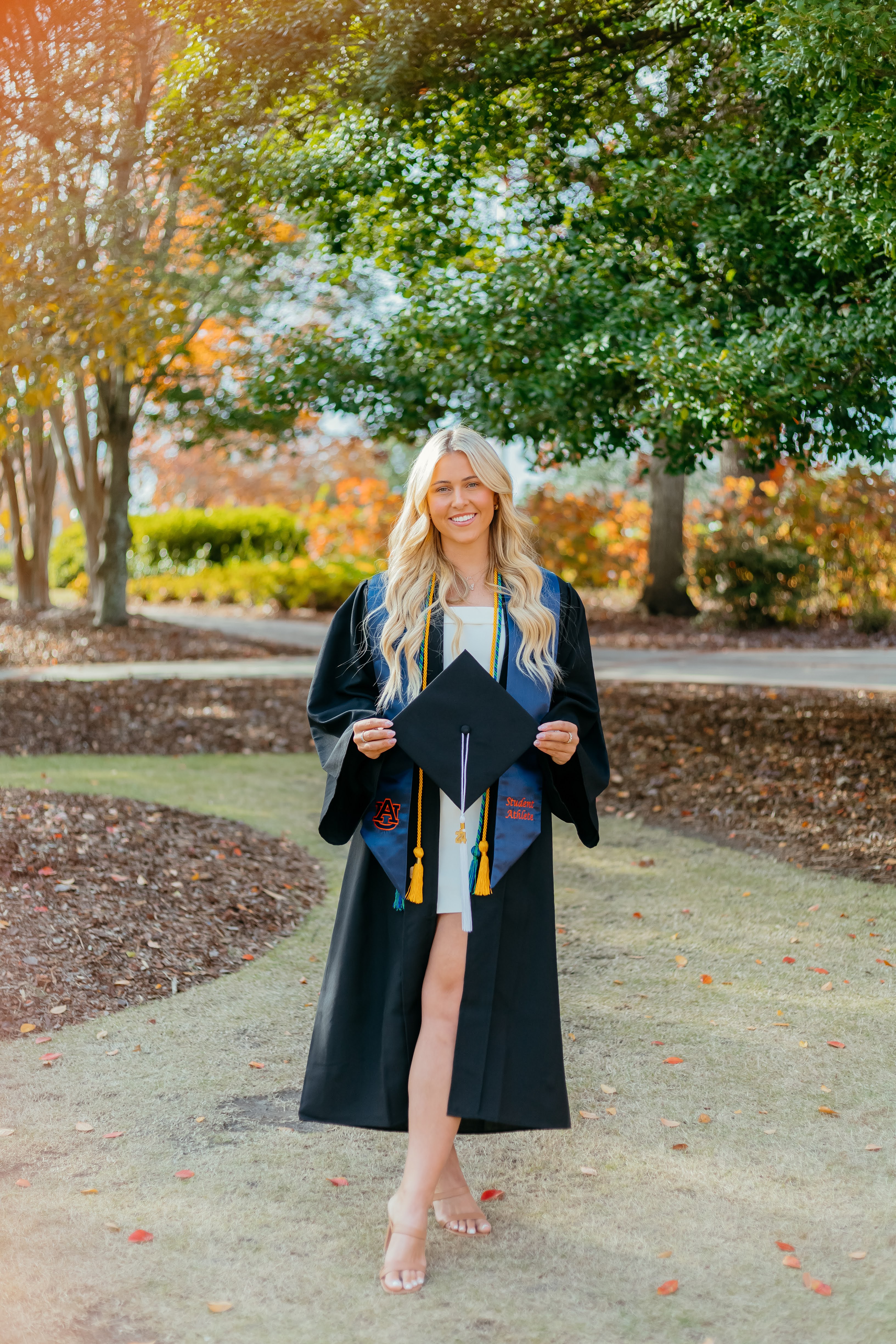 Auburn graduation cap and gown